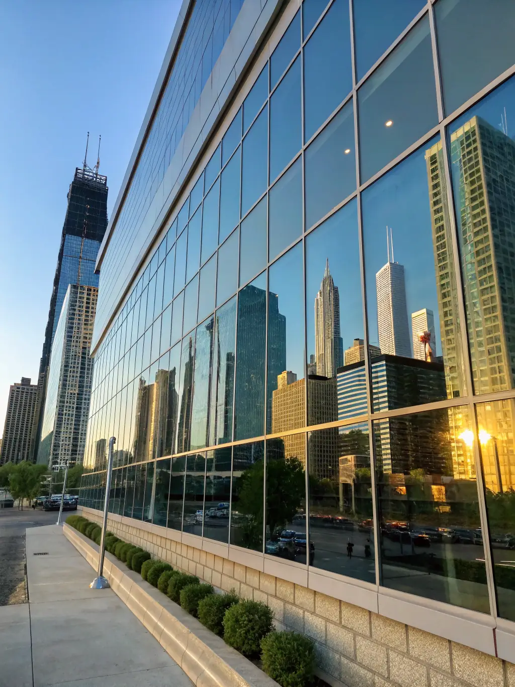 A clear image of a commercial building fitted with high-grade impact-resistant windows, emphasizing the security and aesthetic benefits for businesses.